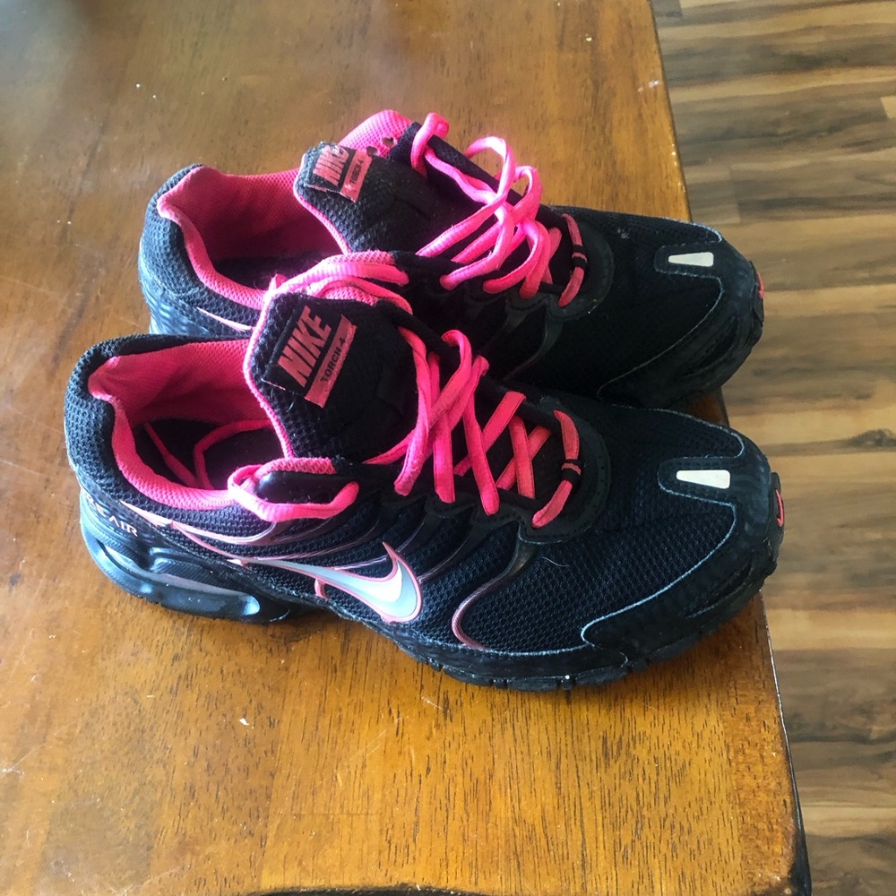 Women’s size 10 Nike Torch4 shoes. Very little use.